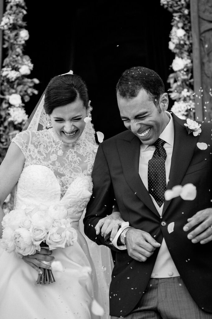 Groom and best man sharing a laugh before the ceremony.