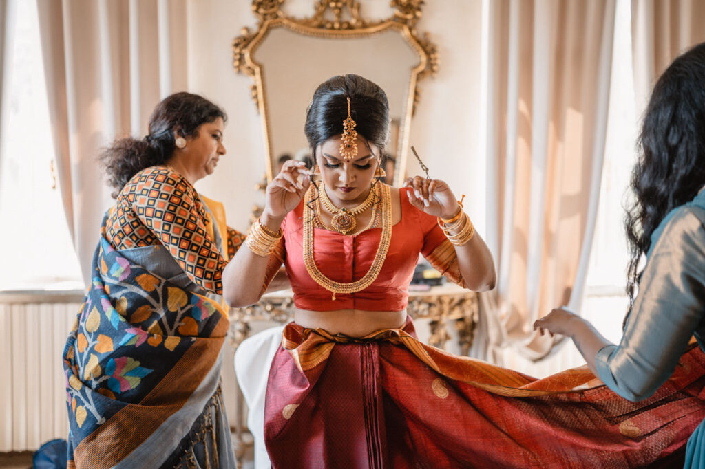 Bridal party enjoying a candid moment together.
